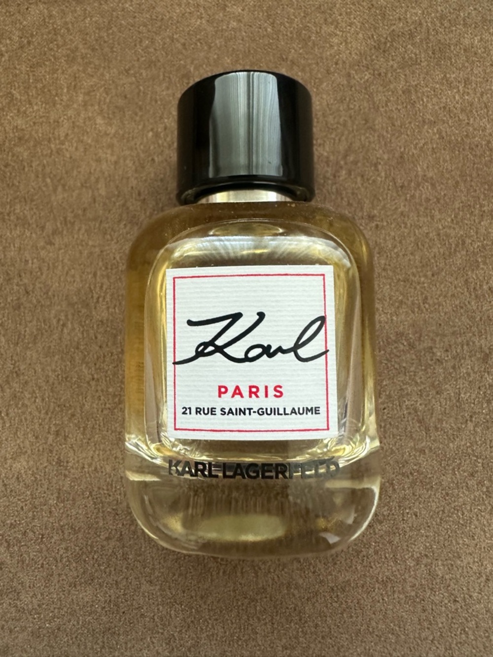 Karl Lagerfeld Eau de Parfum Bottle with Golden Liquid